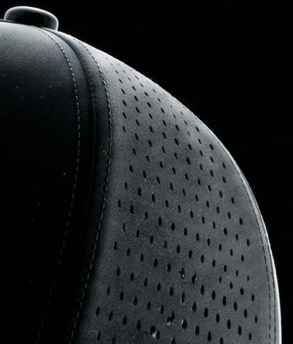 Subtle water-droplet perforated holes for increased breathability. 