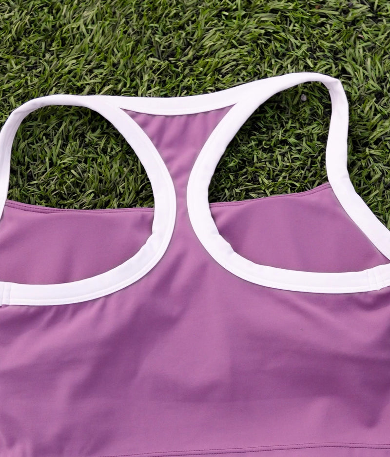 Racerback design and removable bra for extra support.